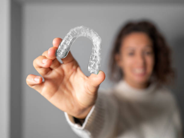 Clear Aligners Market by Age-group (Teenagers and Adults), by Mode of Dispensing (Dental & Orthodontics Clinics and Hospitals), by Usage (In-office Aligners and At-home Aligners) - (Global Outlook & Forecast 2022-2030